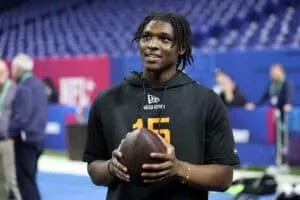 INDIANAPOLIS, INDIANA - MARCH 01: Cameron Ward #QB15 of Miami-FL looks o during the NFL Scouting Combine at Lucas Oil Stadium on March 01, 2025 in Indianapolis, Indiana.