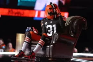 CLEVELAND, OHIO - APRIL 29: A Cleveland Browns fan sits onstage during round one of the 2021 NFL Draft at the Great Lakes Science Center on April 29, 2021 in Cleveland, Ohio.