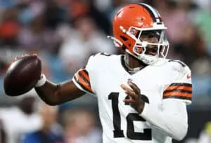 CHARLOTTE, NORTH CAROLINA - AUGUST 08: Quarterback Shedeur Sanders #12 of the Cleveland Browns drops to pass in the first half during the NFL Preseason 2025 game against the Carolina Panthers at Bank of America Stadium on August 08, 2025 in Charlotte, North Carolina.