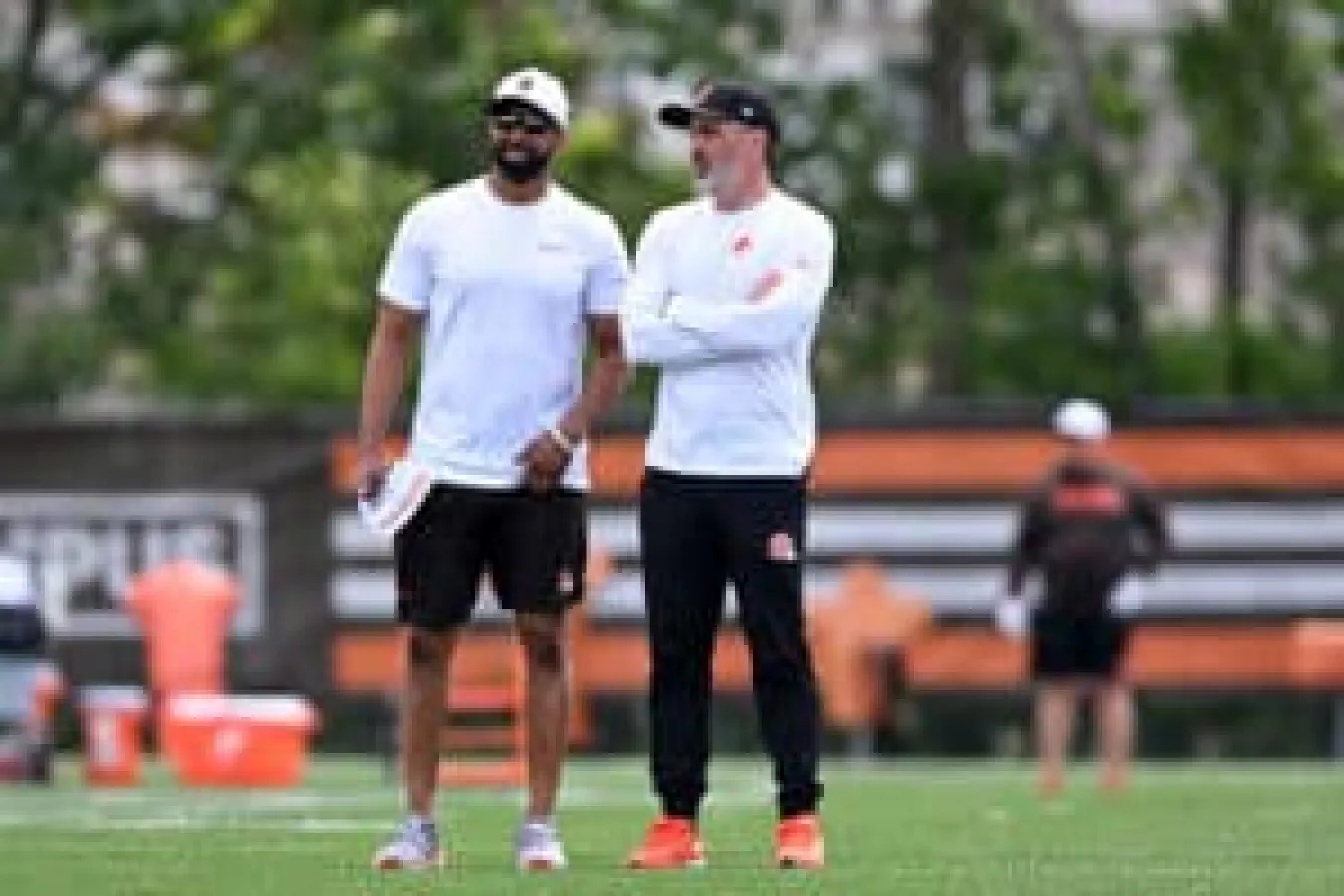 BEREA, OHIO - JUNE 10: Executive vice president, football operations & general manager Andrew Berry of the Cleveland Browns talks with head coach Kevin Stefanski during Cleveland Browns mandatory minicamp at CrossCountry Mortgage Campus on June 10, 2025 in Berea, Ohio.