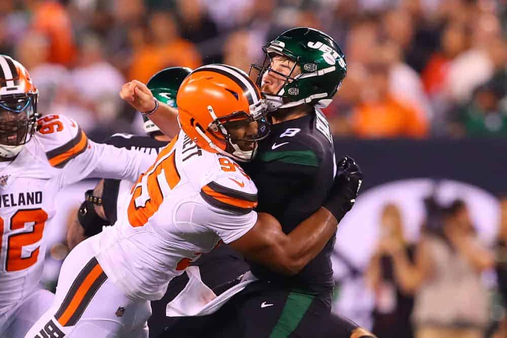 Cleveland Browns defensive end Myles Garrett (95) hits New York Jets quarterback Luke Falk (8) during the fourth quarter of the National Football League game between the New York Jets and the Cleveland Browns on September 16, 2019 at MetLife Stadium in East Rutherford, NJ.