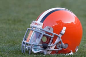 A Cleveland Browns helmet sits on the turf prior to the preseason game against the Detroit Lions played at Cleveland Browns Stadium in Cleveland, Ohio