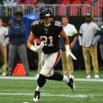 Atlanta Falcons TIght End Austin Hooper (81) rushes the ball during the NFL game between the Seattle Seahawks and the Atlanta Falcons on October 27, 2019, at Mercedes-Benz Stadium in Atlanta, GA.