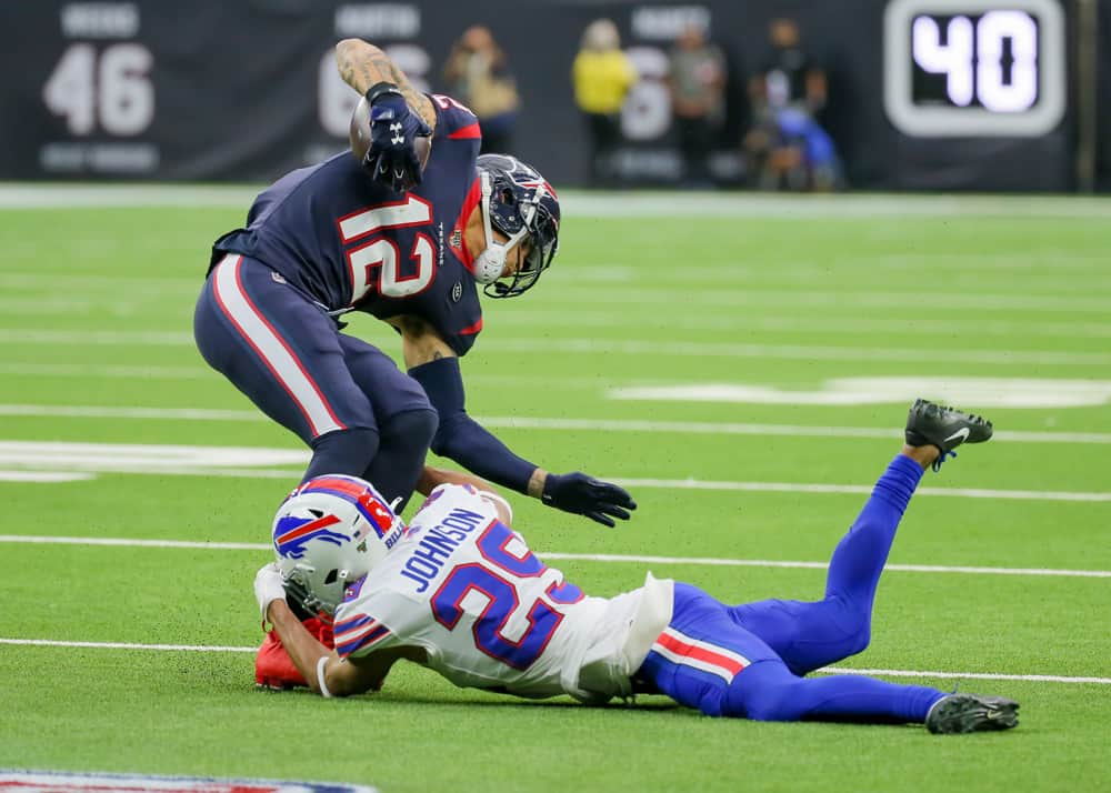 Buffalo Bills cornerback Kevin Johnson (29) tackles Houston Texans wide receiver Kenny Stills (12) in the first half of the AFC Wild Card football game between the Buffalo Bills and Houston Texans on January 4, 2020 at NRG Stadium in Houston, TX.