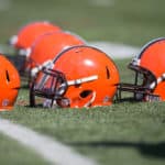 browns helmets on football field