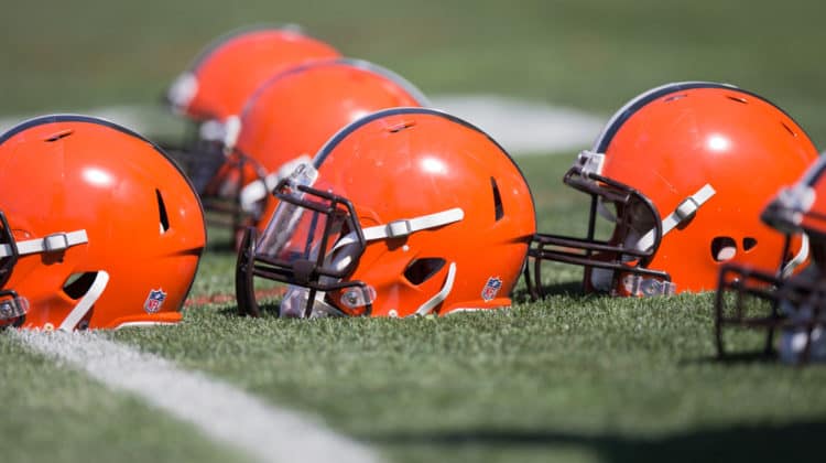 browns helmets on football field