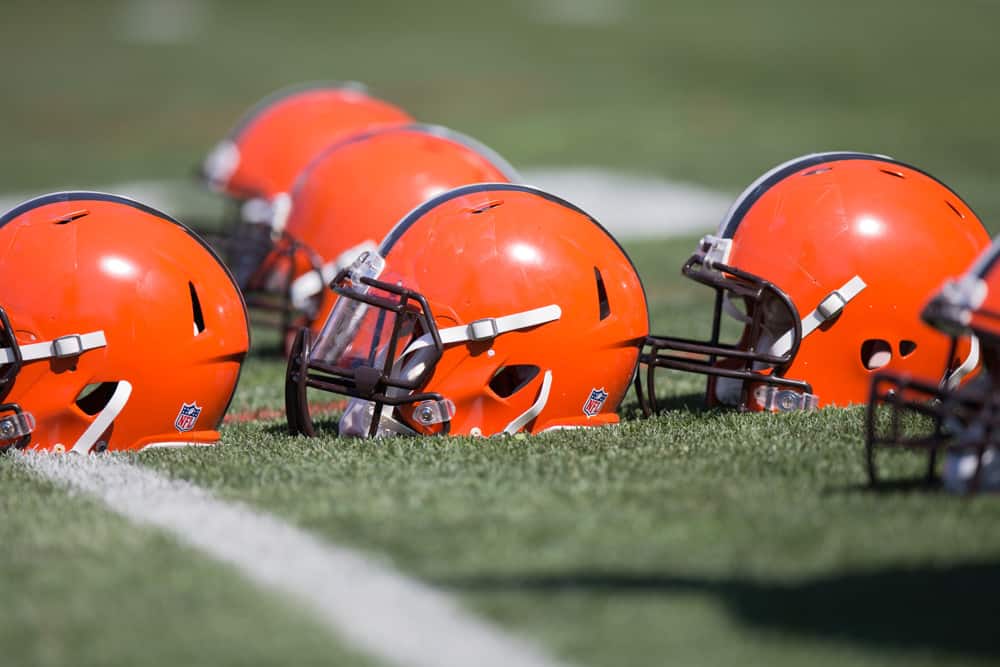 browns helmets on football field