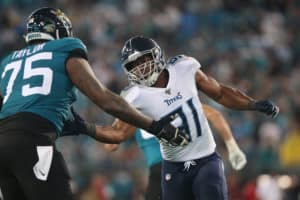 Tennessee Titans Linebacker Cameron Wake (91) is guarded by Jacksonville Jaguars Offensive Tackle Jawaan Taylor (75) during the game between the Tennessee Titans and the Jacksonville Jaguars on September 19, 2019 at TIAA Bank Field in Jacksonville, Fl.