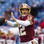 colt mccoy getting ready to throw football