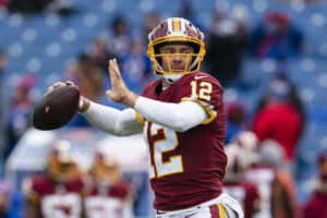 colt mccoy getting ready to throw football