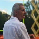 Browns reporter Tony Grossi standing on football field