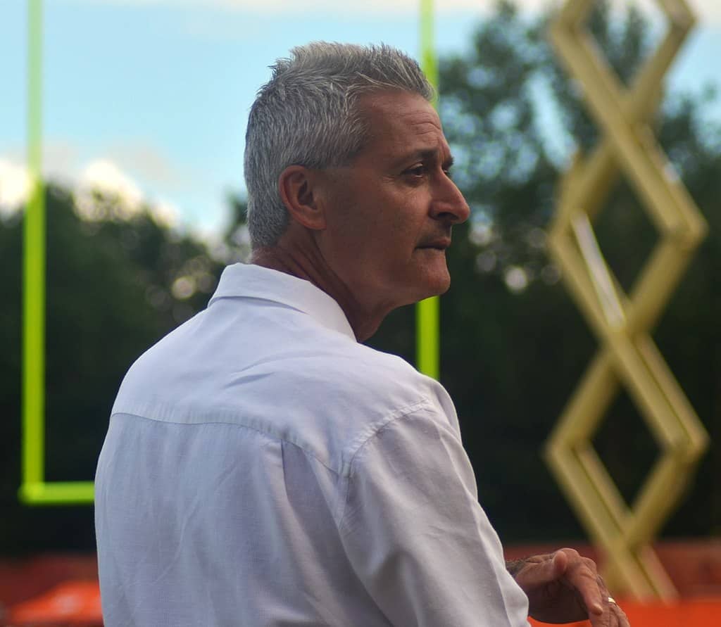 Browns reporter Tony Grossi standing on football field