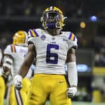 LSU Tigers linebacker Jacob Phillips (6) celebrates after scoring a touchdown on an interception during the game between the Miami Hurricanes and the LSU Tigers on September 2, 2018 at AT&T Stadium in Arlington, Texas.