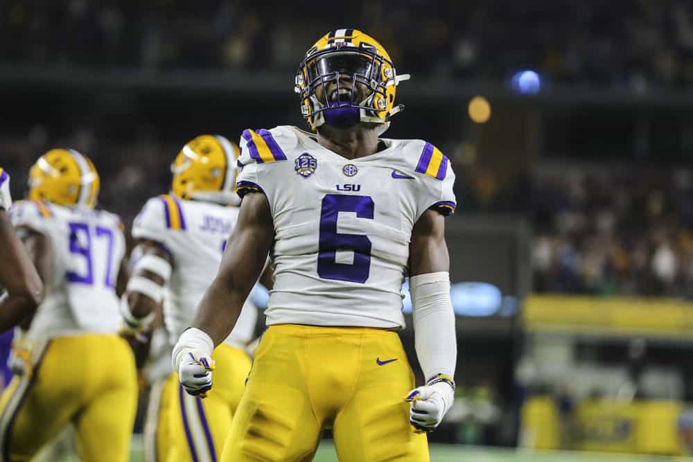 LSU Tigers linebacker Jacob Phillips (6) celebrates after scoring a touchdown on an interception during the game between the Miami Hurricanes and the LSU Tigers on September 2, 2018 at AT&T Stadium in Arlington, Texas. 