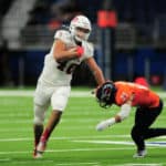 UT-San Antonio Roadrunners DB Carl Austin III (25) dives at Florida Atlantic University Owls TE Harrison Bryant (40) during conference USA game on November 23, 2019 at the Alamodome in San Antonio, Texas.