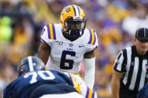 LSU Tigers linebacker Jacob Phillips (6) looks into the backfield during the game between the LSU Tigers and Georgia Southern Eagles at LSU Tiger Stadium on August 31, 2019 in Baton Rouge, LA.