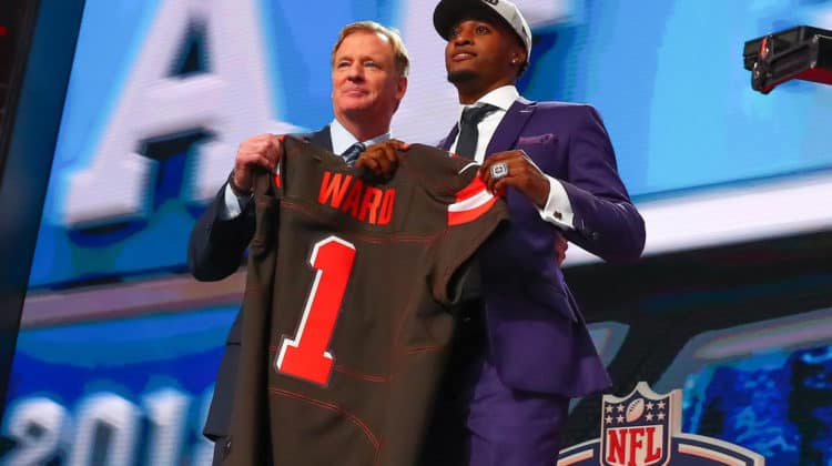 NFL Commissioner Roger Goodell poses for photos with Denzel Ward the fourth overall pick by the Cleveland Browns during the first round at the 2018 NFL Draft at AT&T Statium on April 26, 2018 at AT&T Stadium in Arlington Texas.