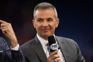 Fox Sports analyst Urban Meyer on the sidelines before the Big 10 Championship game between the Wisconsin Badgers and Ohio State Buckeyes on December 7, 2019, at Lucas Oil Stadium in Indianapolis, IN.