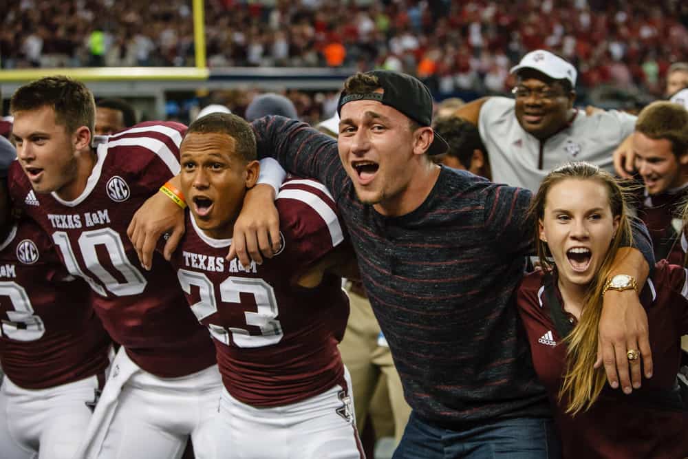 Cleveland Browns Quarterback and former Texas A&M star Johnny Manziel celebrates with the team after the Southwest Classic football game between the Arkansas Razorbacks and the Texas A&M Aggies played at AT&T Stadium in Arlington, TX. Texas A&M defeats Arkansas 35-28 in overtime.