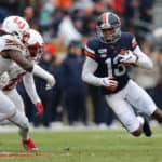 Virginia Cavaliers wide receiver Terrell Jana (13) rushes up field attempting to elude Liberty Flames linebacker Solomon Ajayi (14) during a game between the Liberty Flames and the Virginia Cavaliers on November 23, 2019, at Scott Stadium in Charlottesville, VA.