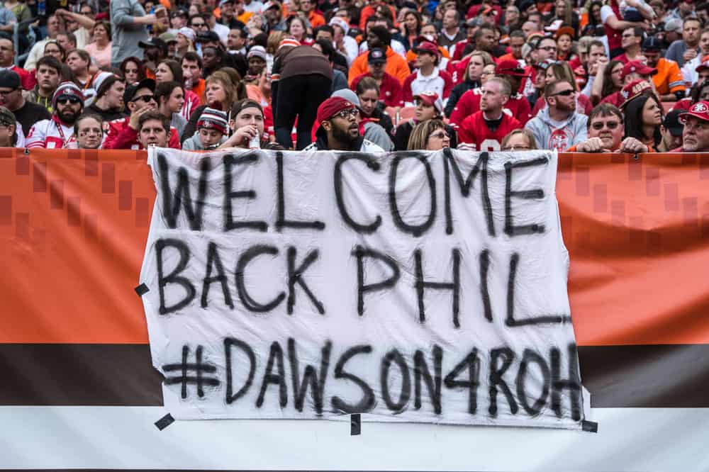 A Cleveland Browns fan hangs a sign to welcome San Francisco 49ers Place Kicker Phil Dawson (9) [3150] to the stadium in action during a NFL game between the San Francisco 49ers and the Cleveland Browns at FirstEnergy Stadium, in Cleveland, OH. 