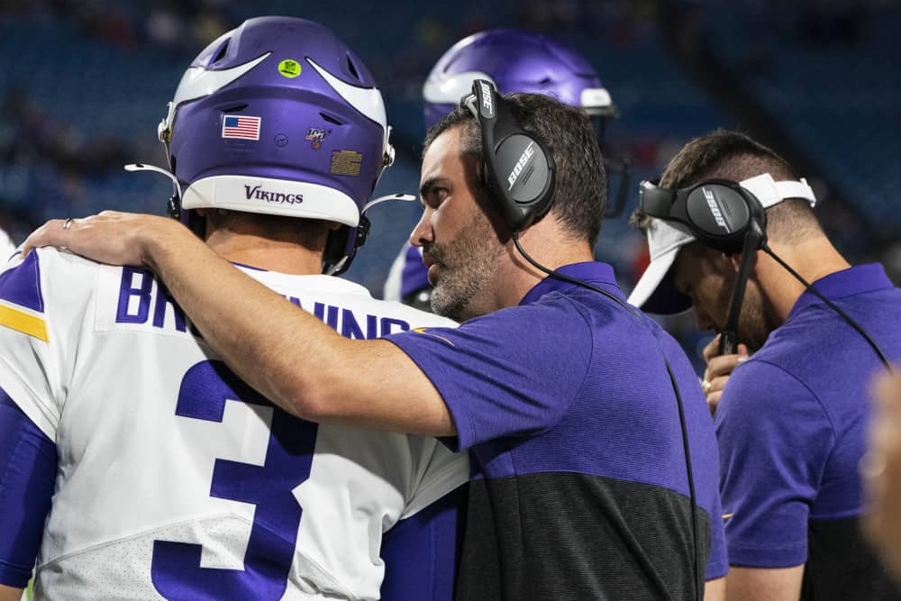 Minnesota Vikings Offensive Coordinator Kevin Stefanski talks with Minnesota Vikings Quarterback Jake Browning (3) during the fourth quarter of the game between the Minnesota Vikings and the Buffalo Bills on August 29, 2019, at New Era Field in Orchard Park, NY.