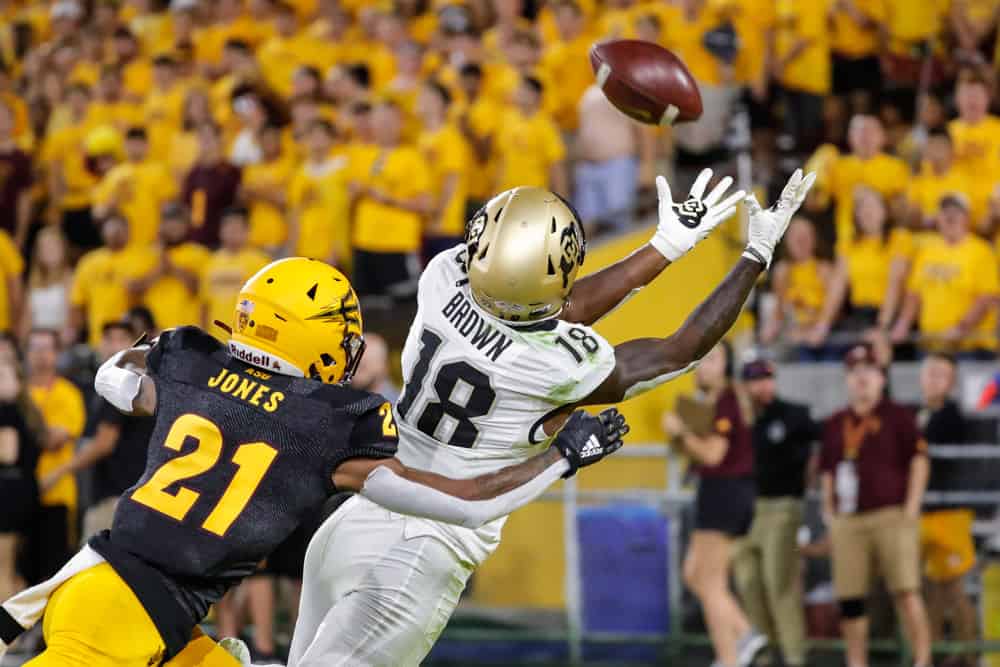 Colorado Buffaloes wide receiver Tony Brown (18) catches a touchdown pass defended by Arizona State Sun Devils defensive back Jack Jones (21) during the college football game between the Colorado Buffaloes and the Arizona State Sun Devils on September 21, 2019 at Sun Devil Stadium in Tempe, Arizona. 