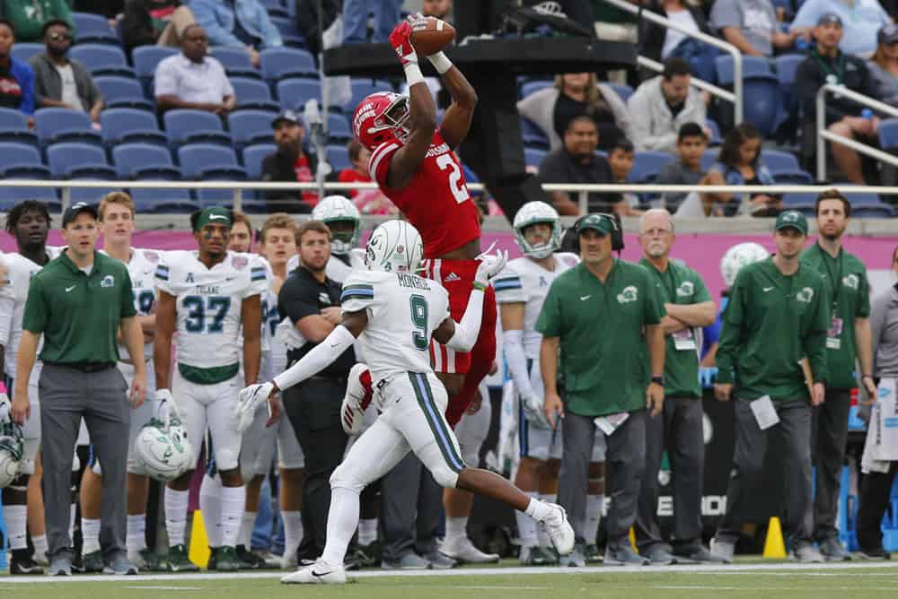 Louisiana RaginÕ Cajuns wide receiver Ja'Marcus Bradley (2) catches a pass over Tulane Green Wave cornerback Jaylon Monroe (9) during the game between the Louisiana Ragin' Cajuns and the Tulane Green Wave on December 15, 2018 at Camping World Stadium in Orlando, Fl.