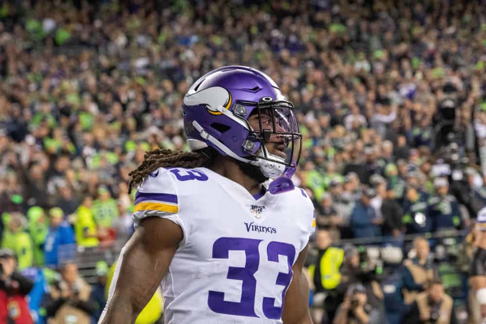 Minnesota Vikings Running Back Dalvin Cook (33) watching a play during an NFL game between the Seattle Seahawks and the Minnesota Vikings on December 02, 2019, at Century Link Stadium in Seattle, WA.