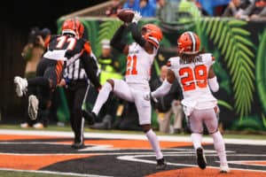 CINCINNATI, OH - DECEMBER 29: Cleveland Browns cornerback Denzel Ward (21) intercepts the ball during the game against the Cleveland Browns and the Cincinnati Bengals on December 29, 2019, at Paul Brown Stadium in Cincinnati, OH.