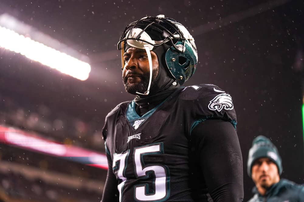 Philadelphia Eagles Defensive End Vinny Curry (75) watches the game from the sideline during the game between the New York Giants and the Philadelphia Eagles on December 09, 2019 a Lincoln Financial Field in Philadelphia, Pennsylvania. 