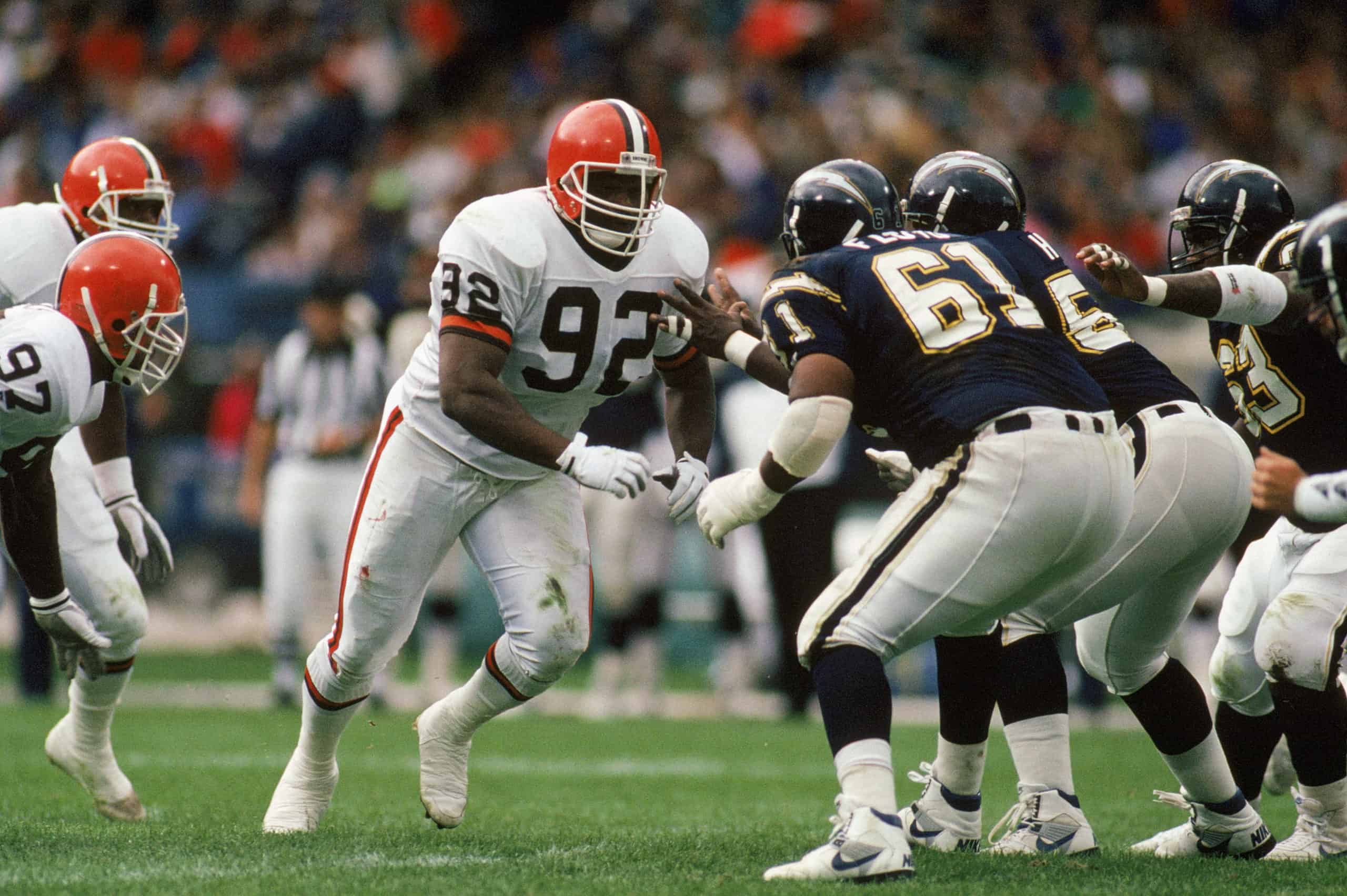 Defensive tackle Michael Dean Perry #92 of the Cleveland Browns runs around the offensive line during an NFL game on September 23, 1990 against the San Diego Chargers. The Chargers defeated the Browns 24-14. 