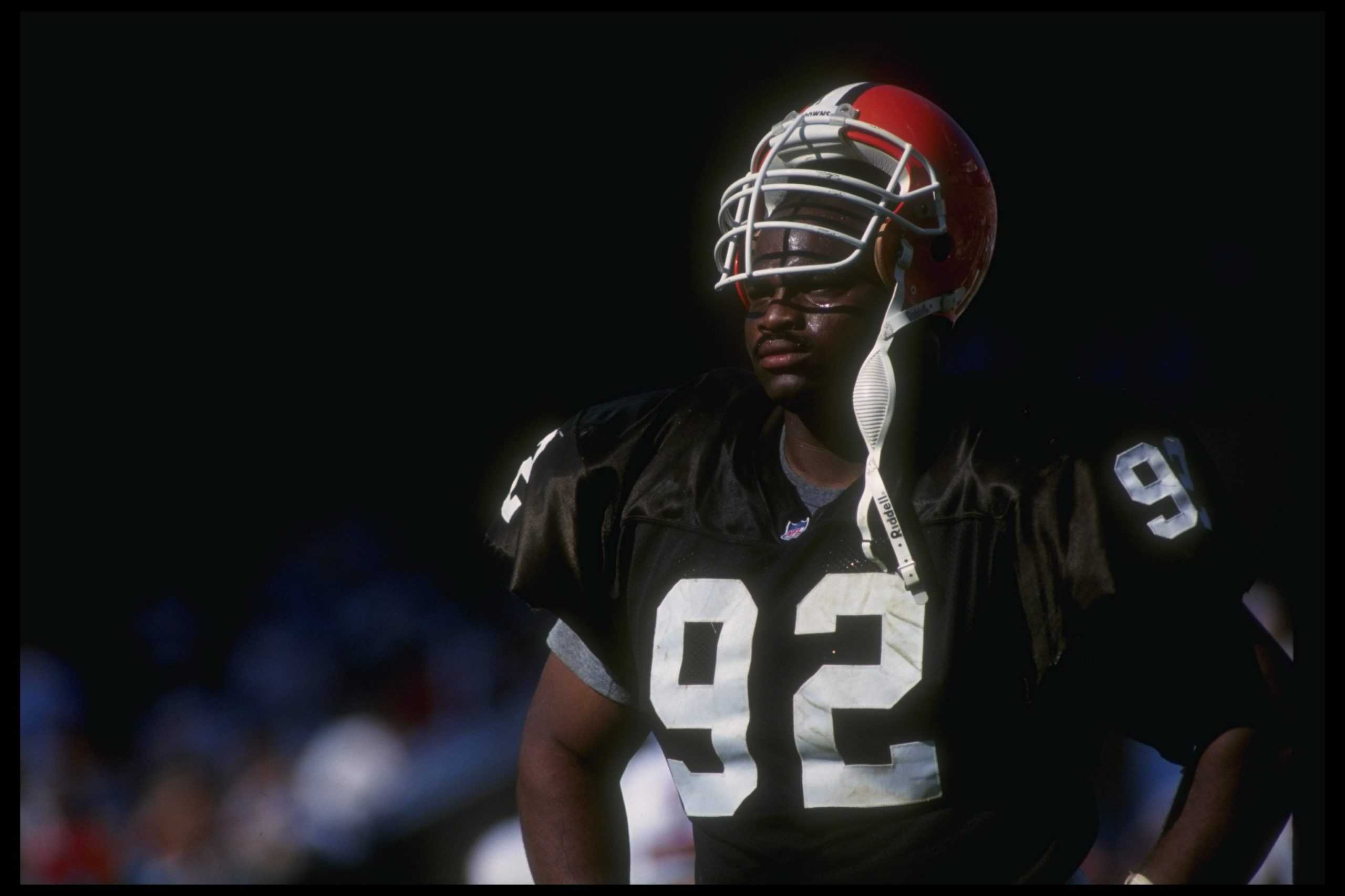 Defensive lineman Michael Dean Perry of the Cleveland Browns looks on during a game against the Denver Broncos at Mile High Stadium in Denver, Colorado. The Broncos won the game, 12-0.