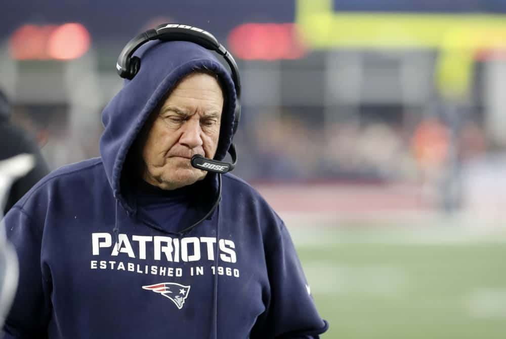 New England Patriots head coach Bill Belichick reacts to a play during an AFC Wild Card game between the New England Patriots and the Tennessee Titans on January 4, 2020, at Gillette Stadium in Foxborough, Massachusetts. 