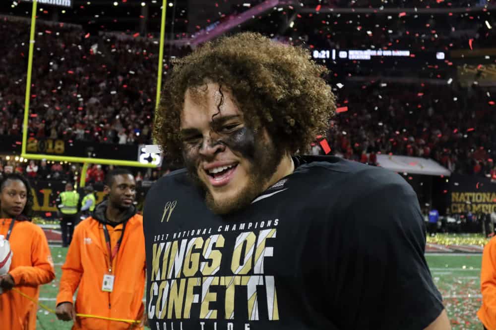 Alabama Crimson Tide offensive lineman Jedrick Wills Jr. (74) celebrates winning the College Football Playoff National Championship Game between the Alabama Crimson Tide and the Georgia Bulldogs on January 8, 2018 at Mercedes-Benz Stadium in Atlanta, GA.