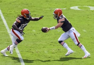 Cleveland Browns running back Kareem Hunt (27) takes a handoff from quarterback Baker Mayfield (6) against the Baltimore Ravens on September 13, 2020, at M&T Bank Stadium in Baltimore, MD.