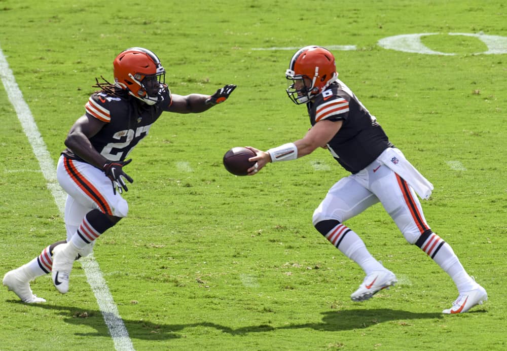 Cleveland Browns running back Kareem Hunt (27) takes a handoff from quarterback Baker Mayfield (6) against the Baltimore Ravens on September 13, 2020, at M&T Bank Stadium in Baltimore, MD. 