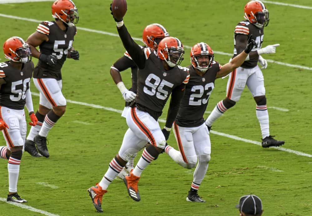 Cleveland Browns defensive end Myles Garrett (95) aided by strong safety Andrew Sendejo (23) celebrates after recovering a fumble against the Baltimore Ravens on September 13, 2020, at M&T Bank Stadium in Baltimore, MD. 