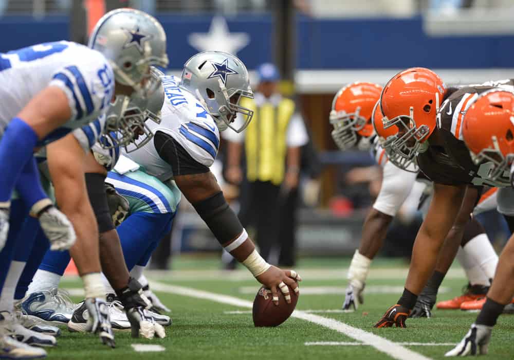 Dallas Cowboys offense and Cleveland Browns defense facing on the line during the game between the Cleveland Browns and the Dallas Cowboys at Cowboys Stadium in Arlington, Texas. Browns leads the 1st half against Cowboys, 13-0.