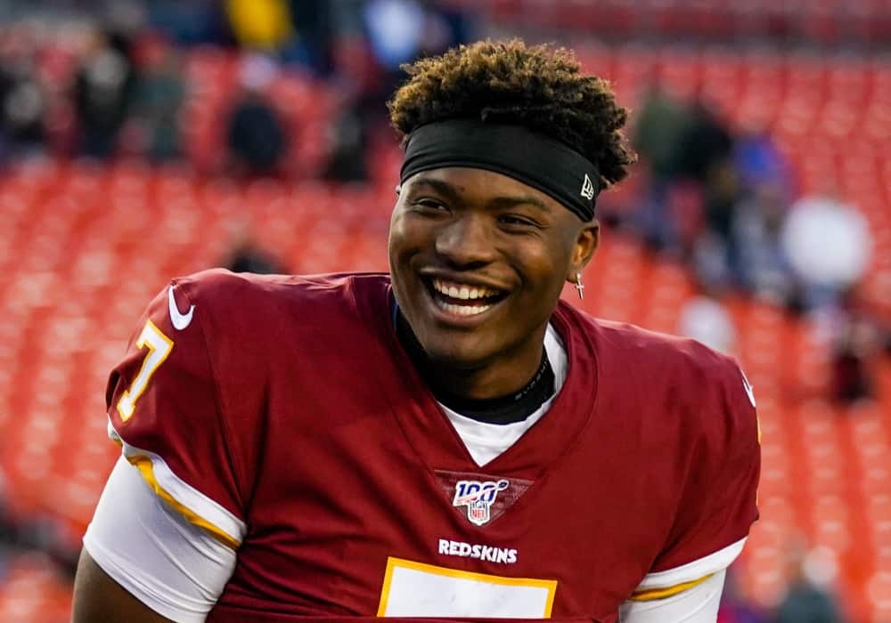 Washington Redskins Quarterback Dwayne Haskins (7) laughs with teammates following the game between the New York Giants and the Washington Redskins on December 22, 2019 at FedExField in Landover, Maryland.