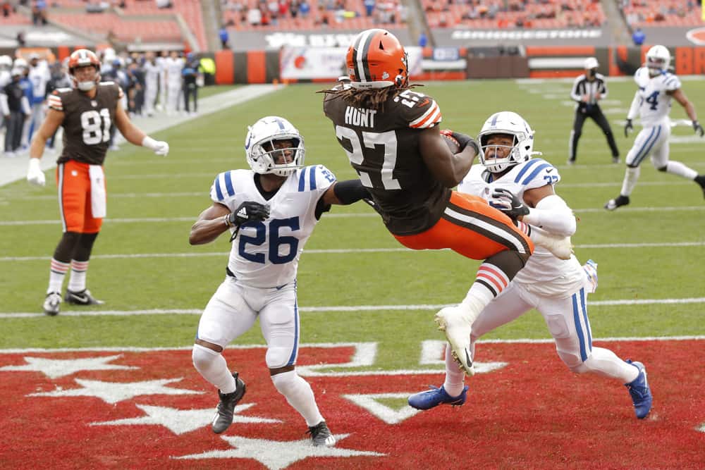 Cleveland Browns Running Back Kareem Hunt (27) makes the catch for a touchdown while being defended by Indianapolis Colts Cornerback Rock Ya-Sin (26) and Indianapolis Colts Safety Khari Willis (37) in game action during a NFL game between the Indianapolis Colts and the Cleveland Browns on October11, 2020 at FirstEnergy Stadium in Cleveland, OH.