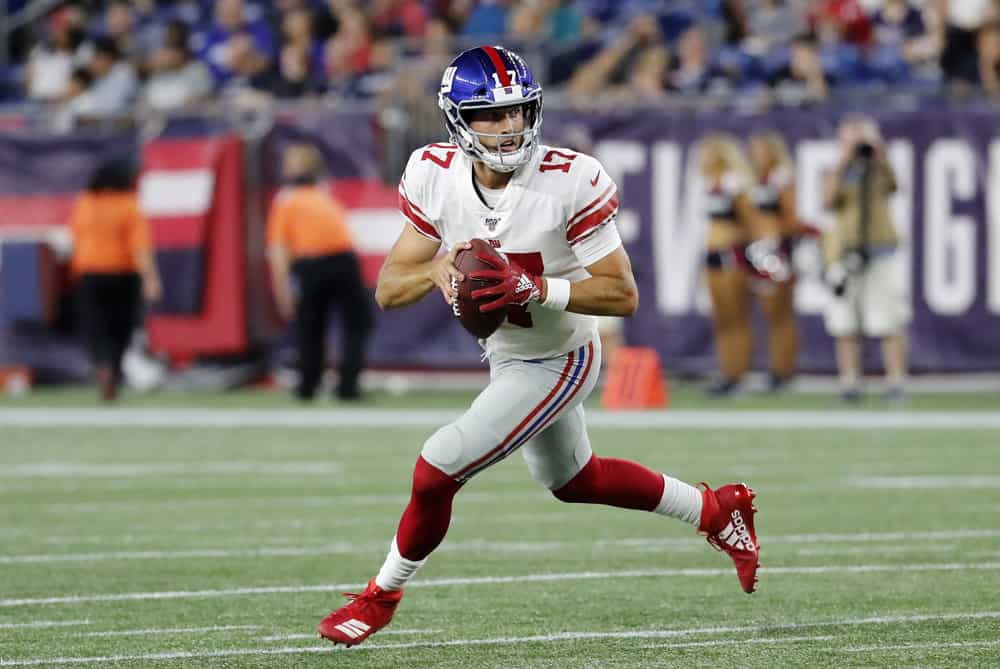 New York Giants quarterback Kyle Lauletta (17) scrambles from the pocket during a game between the New England Patriots and the New York Giants on August 29, 2019, at Gillette Stadium in Foxborough, Massachusetts.