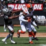 Cleveland Browns Tight End David Njoku (85) is tackled by Oakland Raiders Cornerback Rashaan Melvin (22) during the NFL football game between the Cleveland Browns and the Oakland Raiders on September 30, 2018, at the Oakland Alameda Coliseum in Oakland, CA .