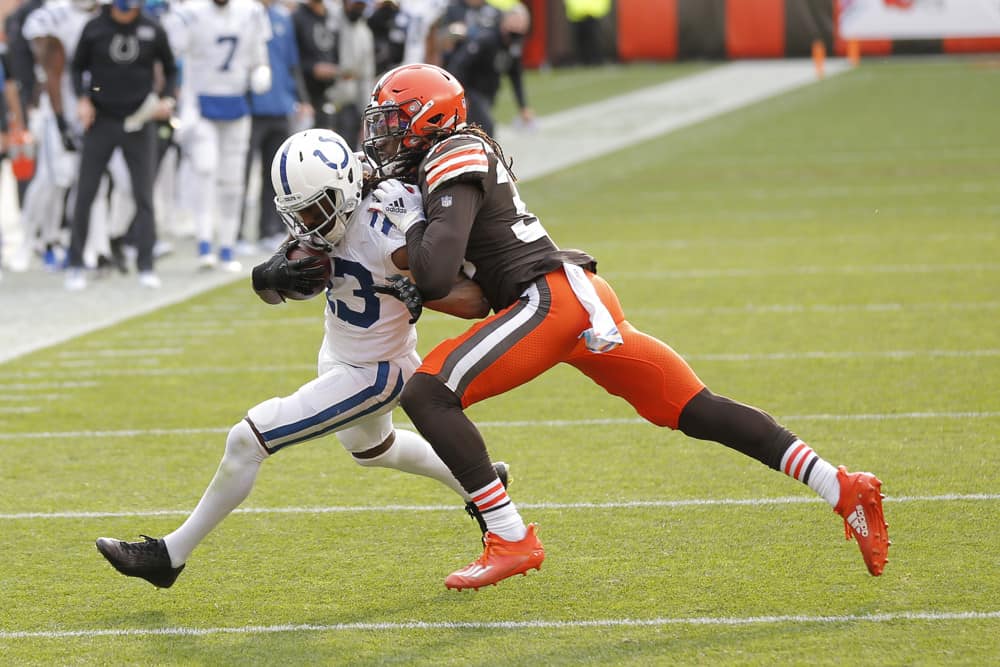 Indianapolis Colts Wide Receiver T.Y. Hilton (13) is taken down by Cleveland Browns Safety Ronnie Harrison (33) in game action during a NFL game between the Indianapolis Colts and the Cleveland Browns on October11, 2020 at FirstEnergy Stadium in Cleveland, OH.