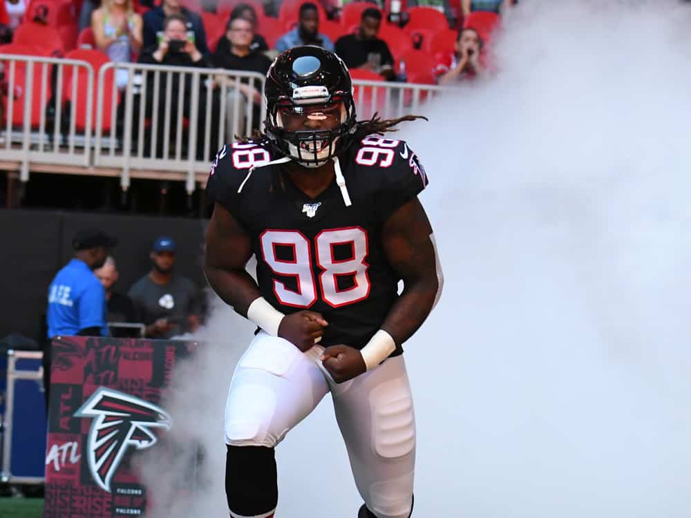 Atlanta Falcons Defensive End Takkarist McKinley (98) sprints onto the field before the NFL game between the Seattle Seahawks and the Atlanta Falcons on October 27, 2019, at Mercedes-Benz Stadium in Atlanta, GA.