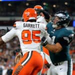 Philadelphia Eagles center Stefen Wisniewski (61) blocks Cleveland Browns defensive end Myles Garrett (95) during the first quarter of the National Football League preseason game between the Philadelphia Eagles and Cleveland Browns on August 23, 2018, at FirstEnergy Stadium in Cleveland, OH. Cleveland defeated Philadelphia 5-0.