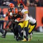 Cleveland Browns running back Kareem Hunt (27) is tackled by Pittsburgh Steelers linebacker T.J. Watt (90) during the fourth quarter of the National Football League game between the Pittsburgh Steelers and Cleveland Browns on November 14, 2019, at FirstEnergy Stadium in Cleveland, OH.