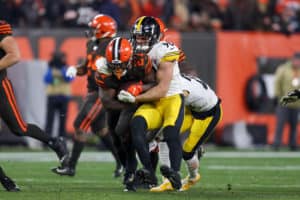 Cleveland Browns running back Kareem Hunt (27) is tackled by Pittsburgh Steelers linebacker T.J. Watt (90) during the fourth quarter of the National Football League game between the Pittsburgh Steelers and Cleveland Browns on November 14, 2019, at FirstEnergy Stadium in Cleveland, OH.