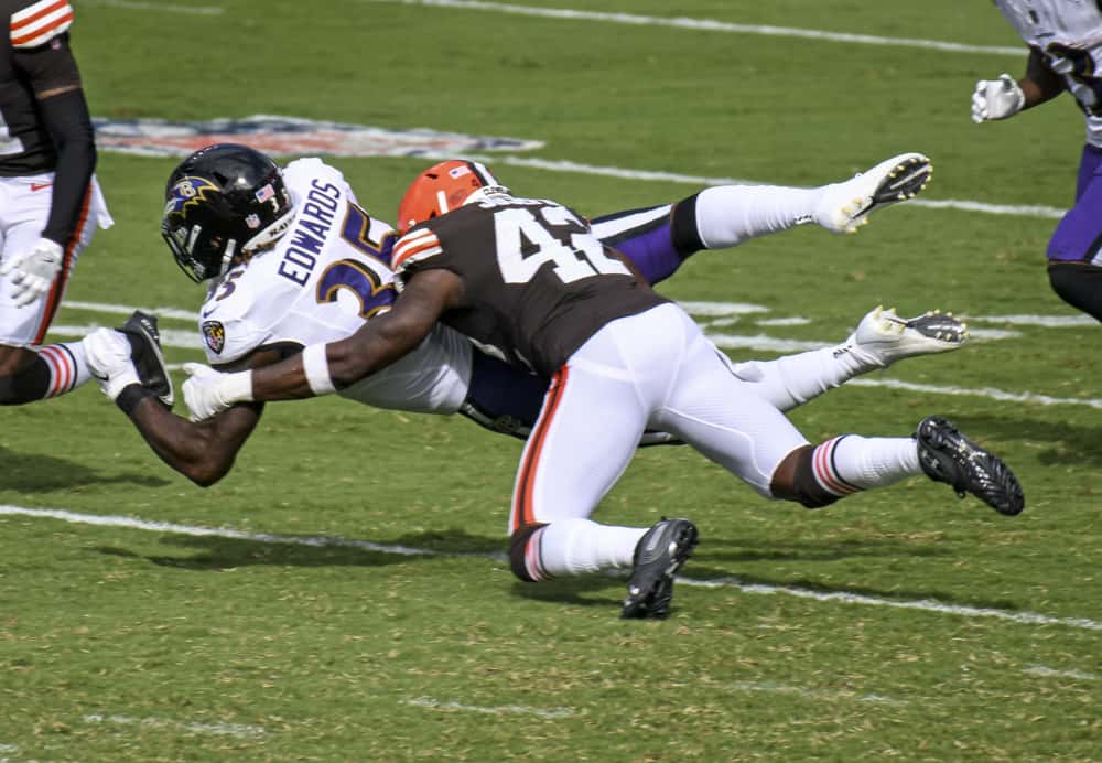 Baltimore Ravens running back Gus Edwards (35) make a reception against Cleveland Browns free safety Karl Joseph (42) on September 13, 2020, at M&T Bank Stadium in Baltimore, MD. 