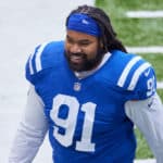 Indianapolis Colts Nose Tackle Sheldon Day (91) looks on in game action during a NFL game between the Indianapolis Colts and the Cincinnati Bengals on October 18, 2020, at Lucas Oil Stadium in Indianapolis, IN.